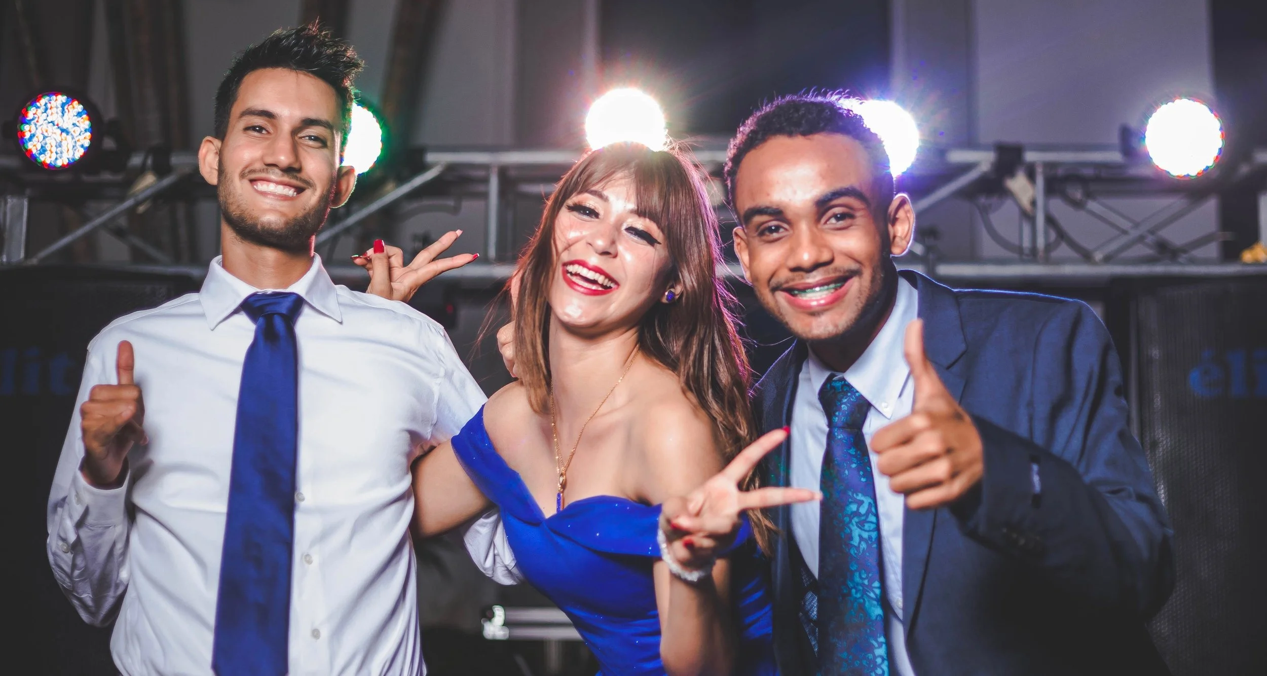 Group of well-dressed friends enjoying a vibrant corporate party
