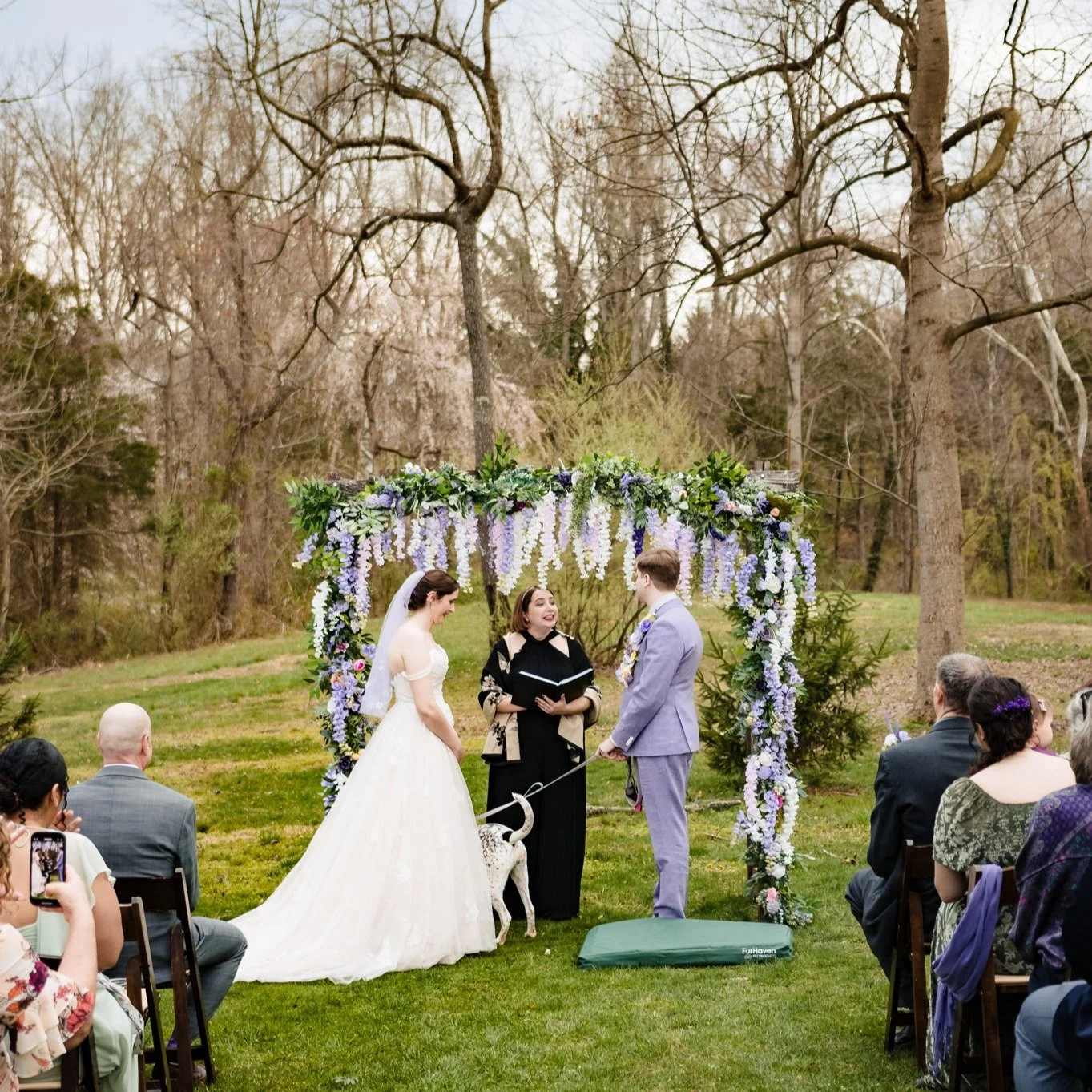 It's not their anniversary for another week, but I think we can cheat, right? This spectacular late March wedding had it all - puppies, live music, and a video game station at the reception. Caitlin and Christian leaned into spring colors and brought