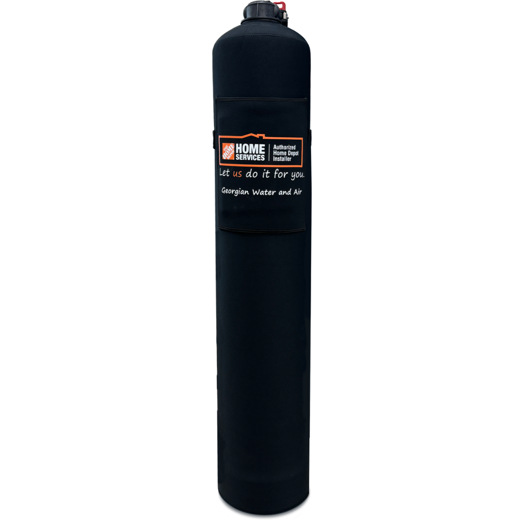 A water softener tank with a label for Home Services Georgia Water and Air installation company.