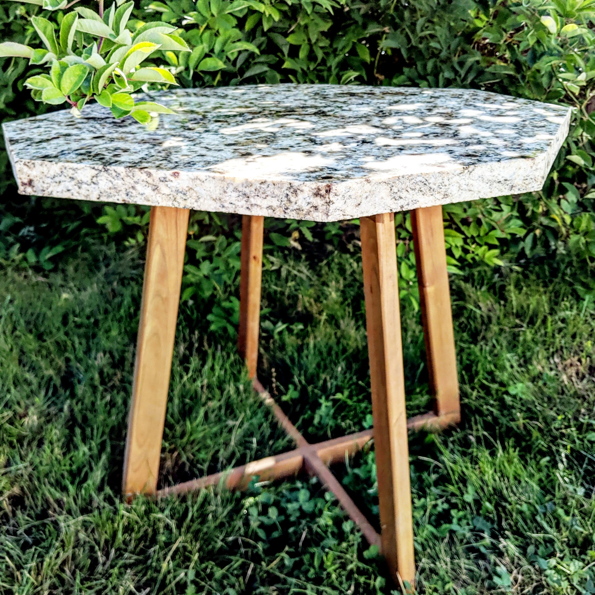 Midcentury modern marble cutout table.