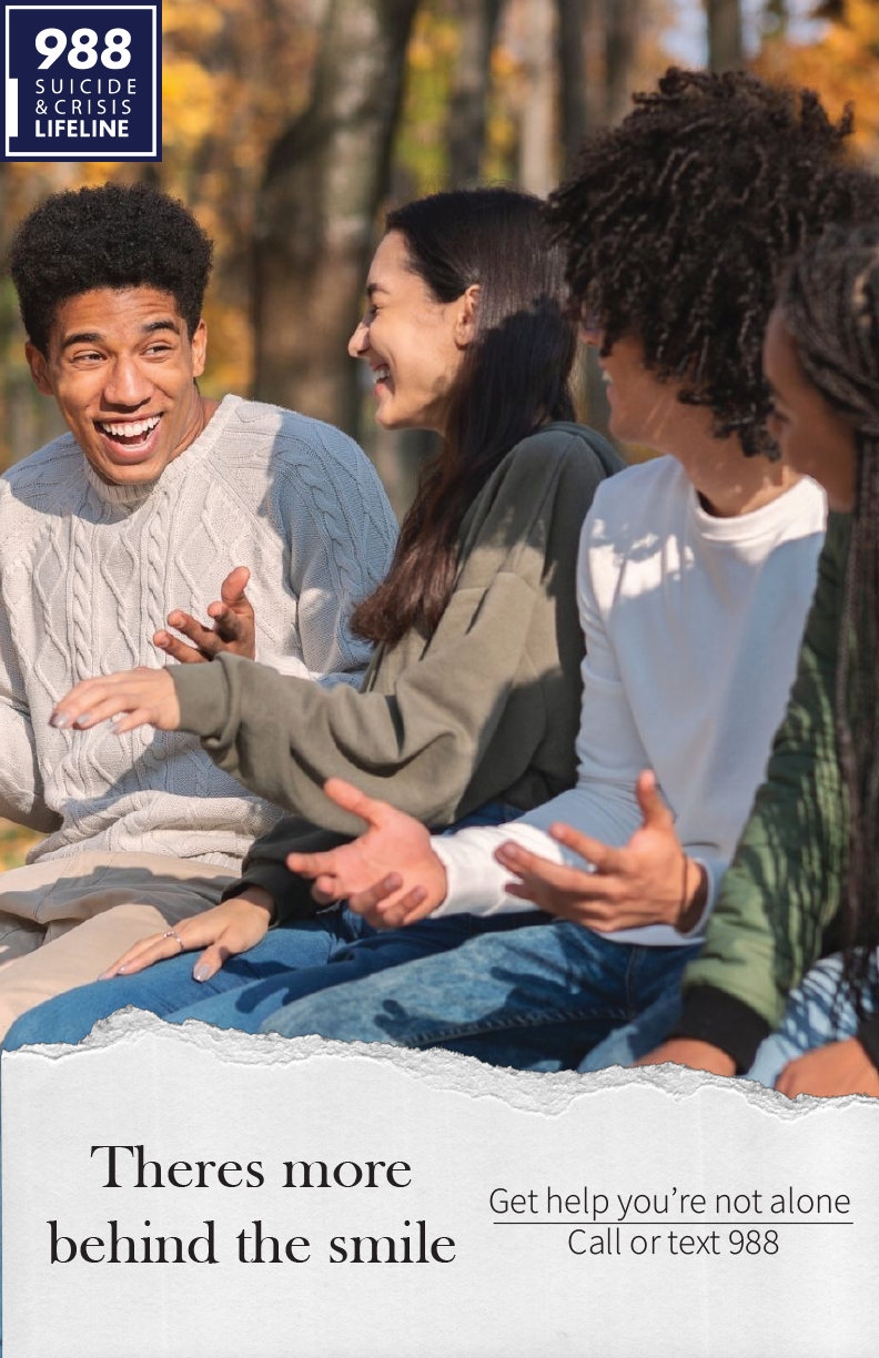 A group of four diverse young adults sitting outdoors in a park, laughing and talking, with autumn trees in the background. There is a suicide and crisis lifeline logo in the top left corner and text at the bottom offering help, supporting mental health.