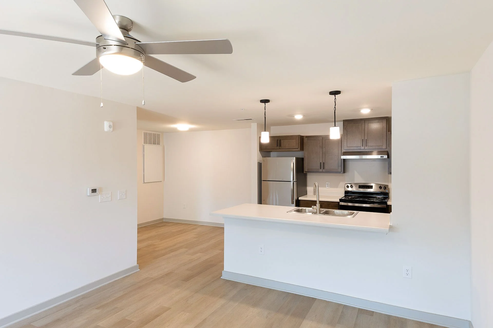 Kitchen with peninsula at The Pines at Peach Road