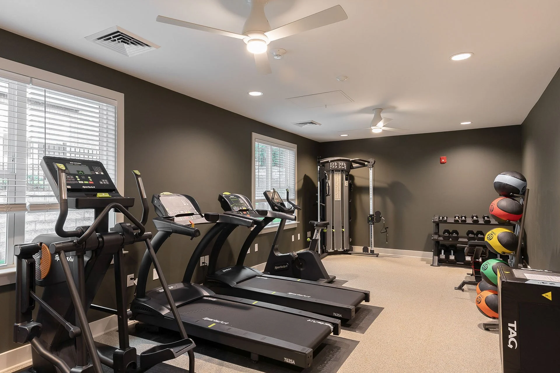 Fitness center with treadmills at The Pines at Peach Road