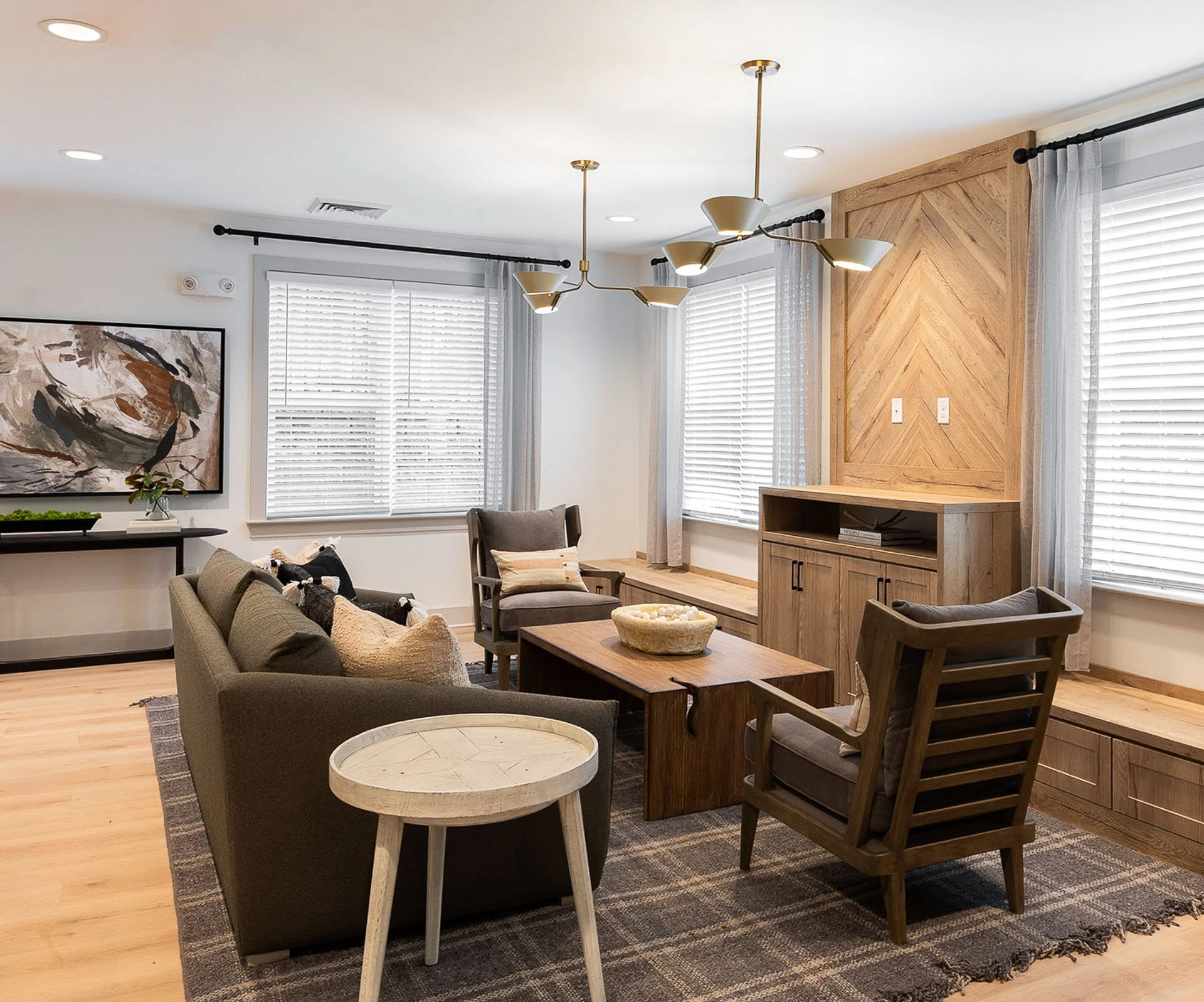 Community room with comfy seating at The Pines at Peach Road