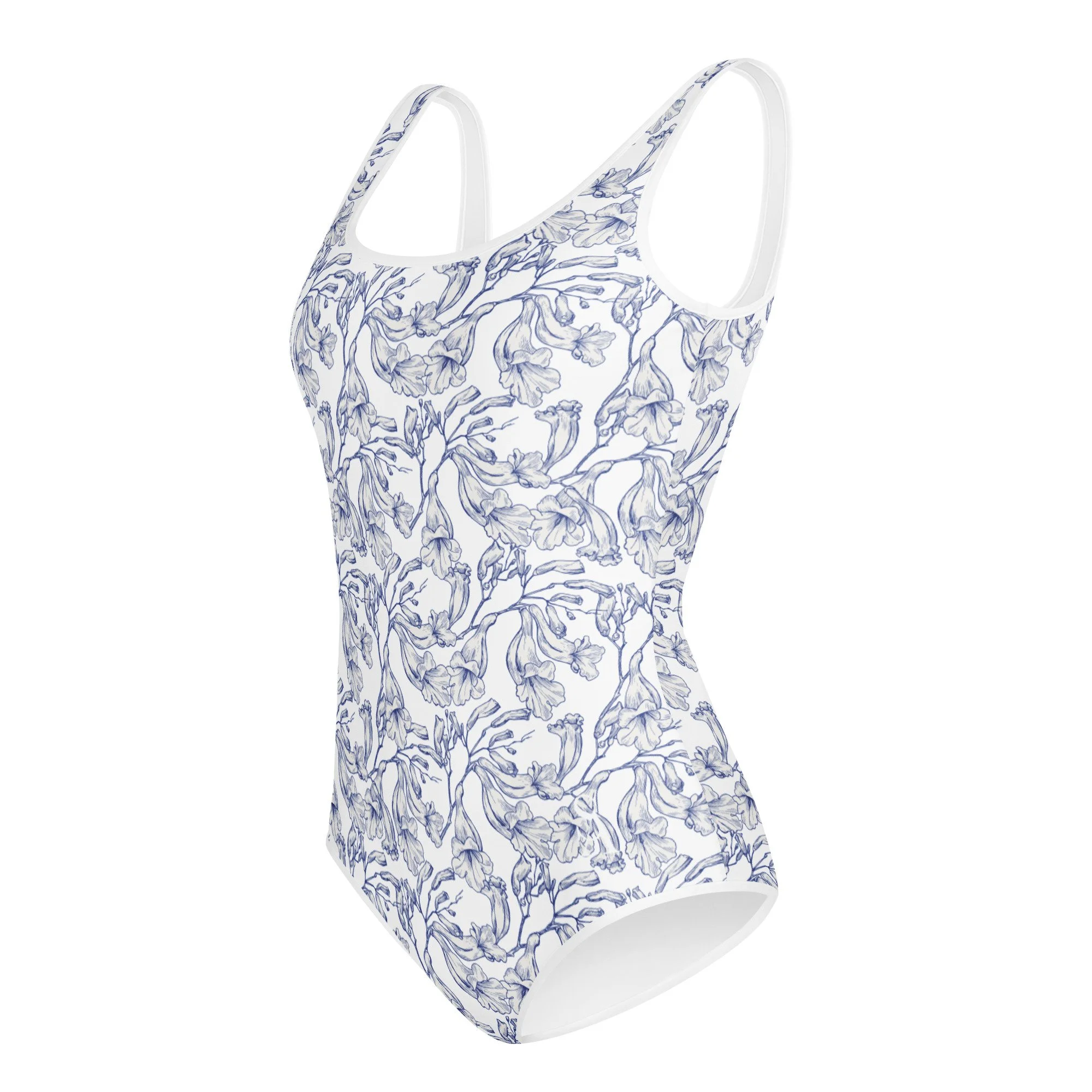 all-over-print-youth-swimsuit-white-left-6a18fd49e1924.jpg