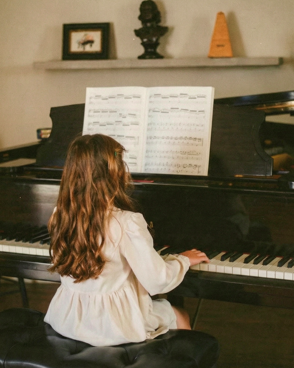 Student receiving a private piano lesson