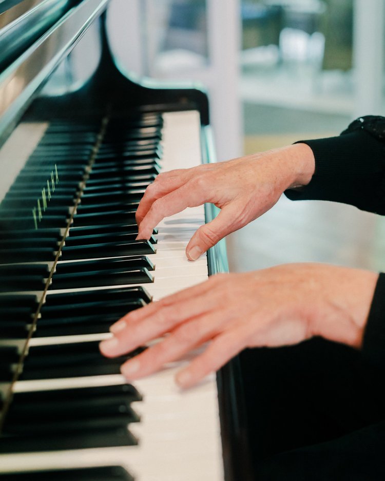Amanda's hands playing the piano