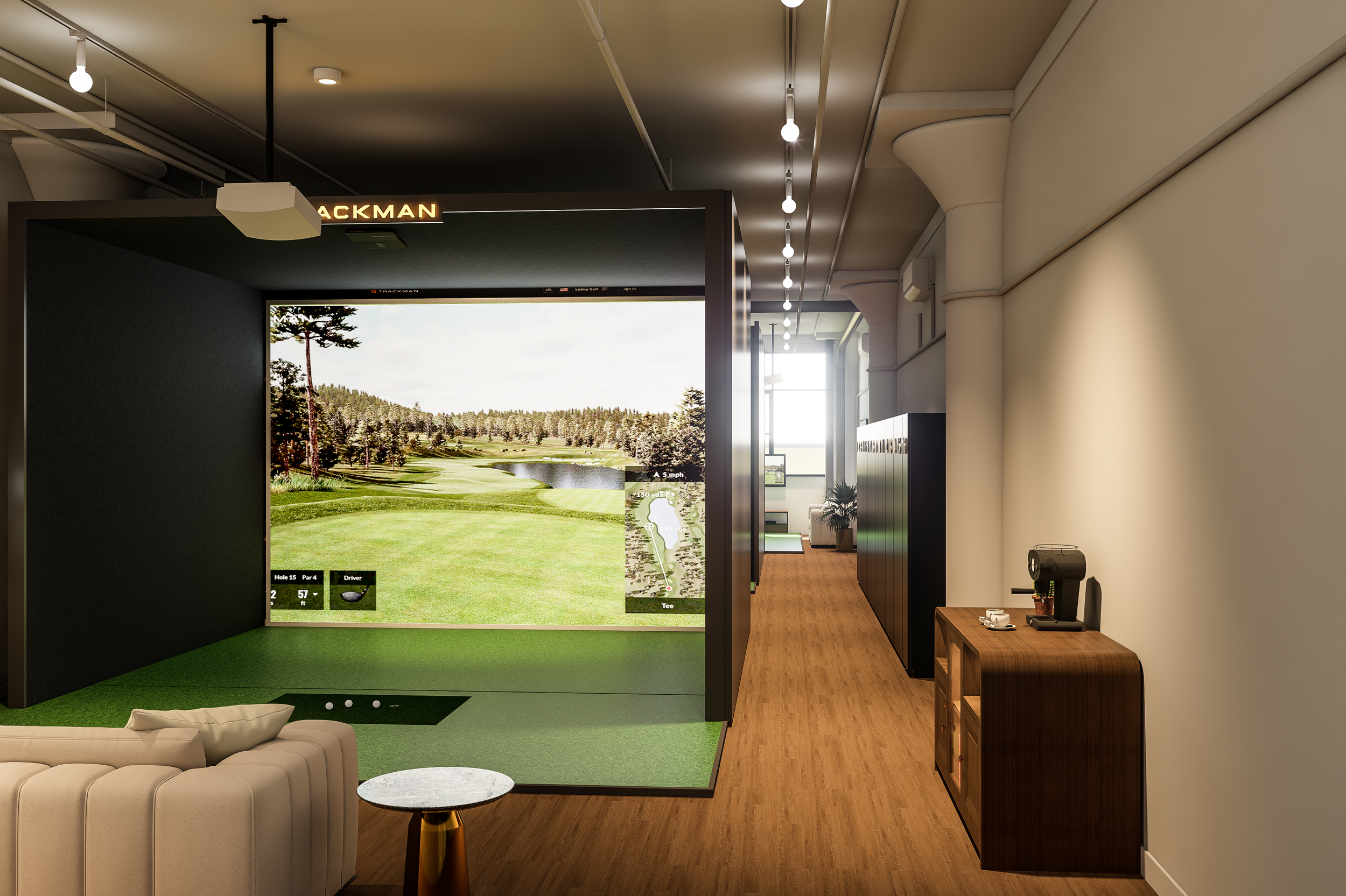 Indoor golf simulator room with screen displaying a golf course, sofa in front, and wooden flooring.