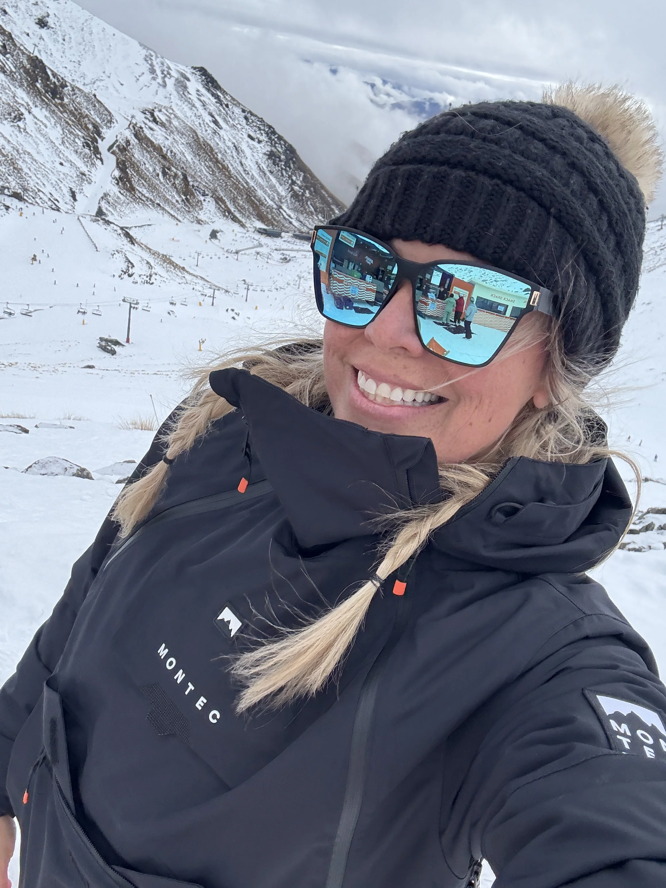 Bettina smiling with snowy background