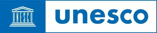 UNESCO logo with a blue background, white text, and a stylized columned building icon.