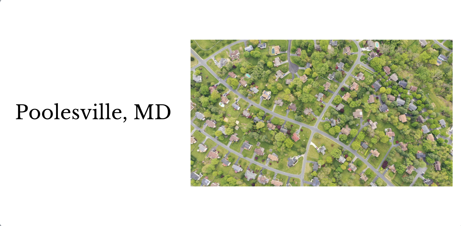 An aerial view of suburban neighborhood with houses and green trees in Poolsville, MD.