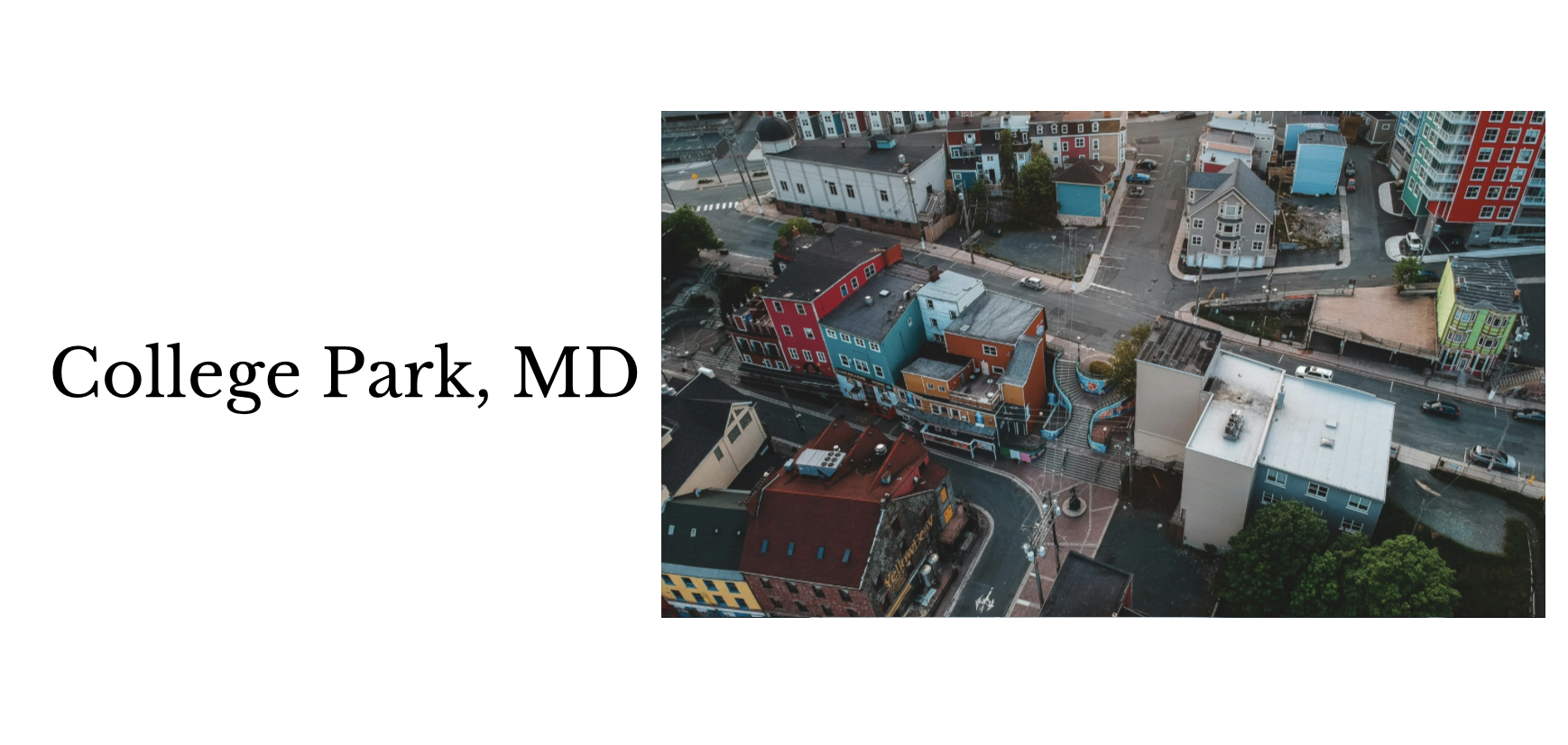 Aerial view of colorful buildings in College Park, Maryland, with streets and cars.