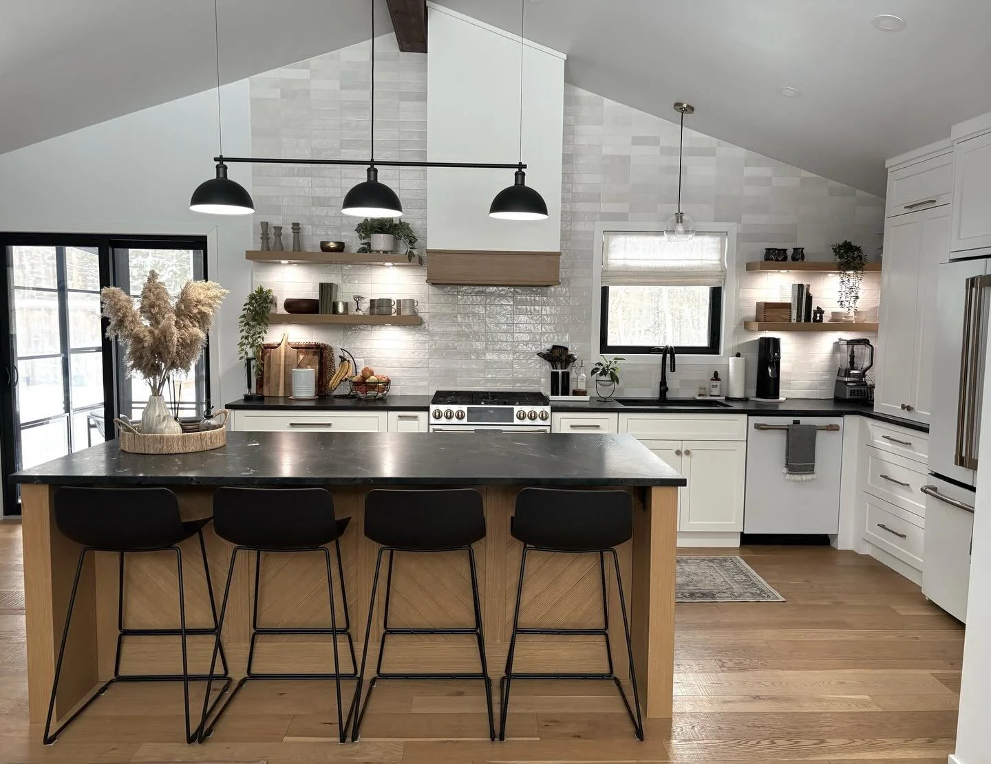 A kitchen reworked with function as the starting point.

The original space felt claustrophobic, with heavy visual boundaries that made the room feel smaller than it was. The redesign focused on improving flow and usability, with material choices and