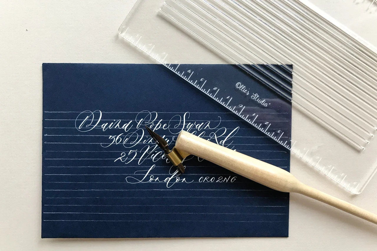 ollie's studio lettering template to address envelopes in calligraphy