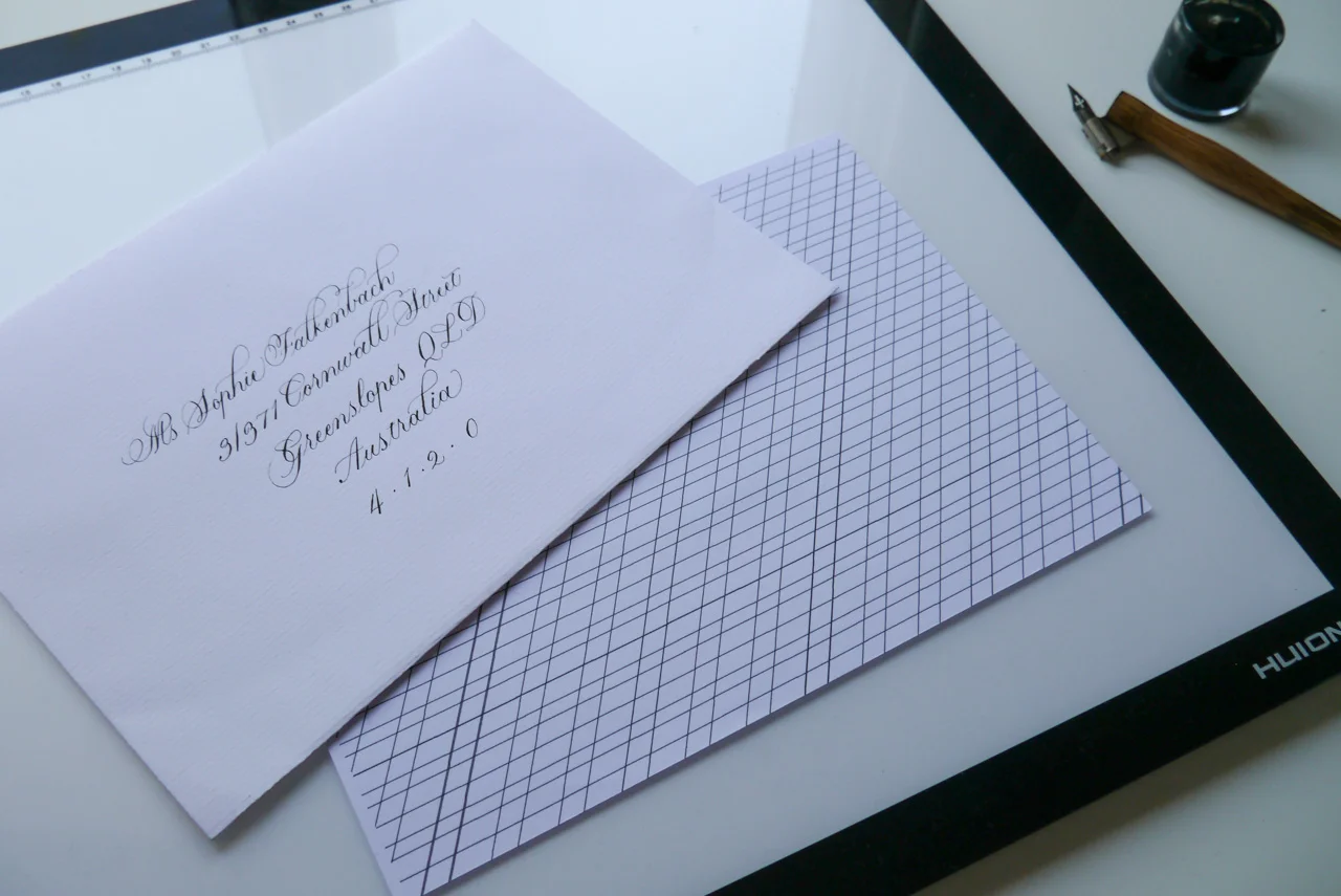 using a lightbox and guidelines to address envelopes in calligraphy