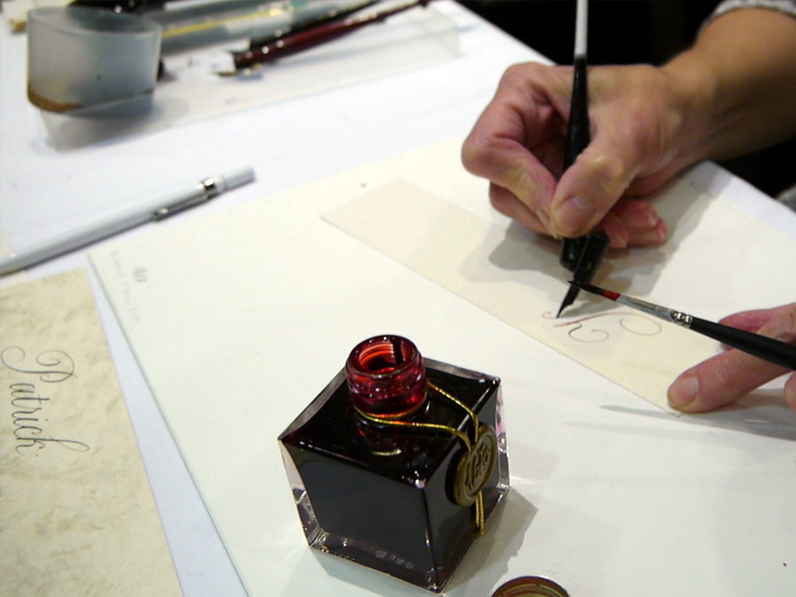 Joy Daniels demonstrates copperplate calligraphy at Fountain Pens at the London Writing Equipment Show