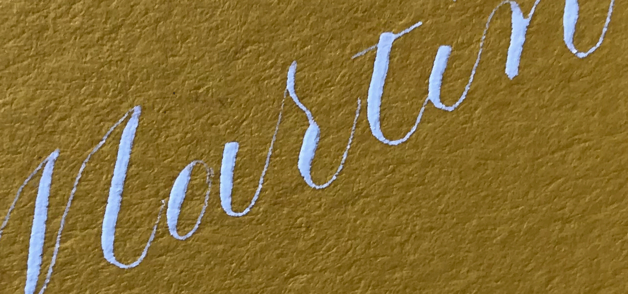 close up of dr ph martin's bleedproof white calligraphy ink