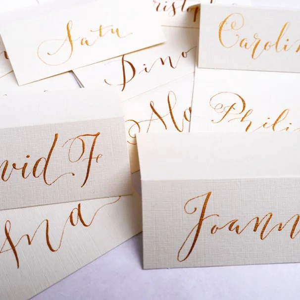 Gold modern calligraphy place cards