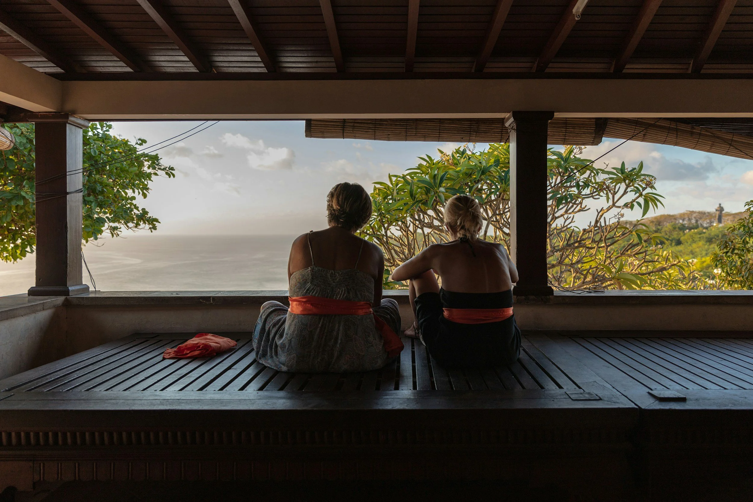 “Two women overlooking the ocean during a luxury wellness retreat focused on embodiment, sisterhood, and restoration.”