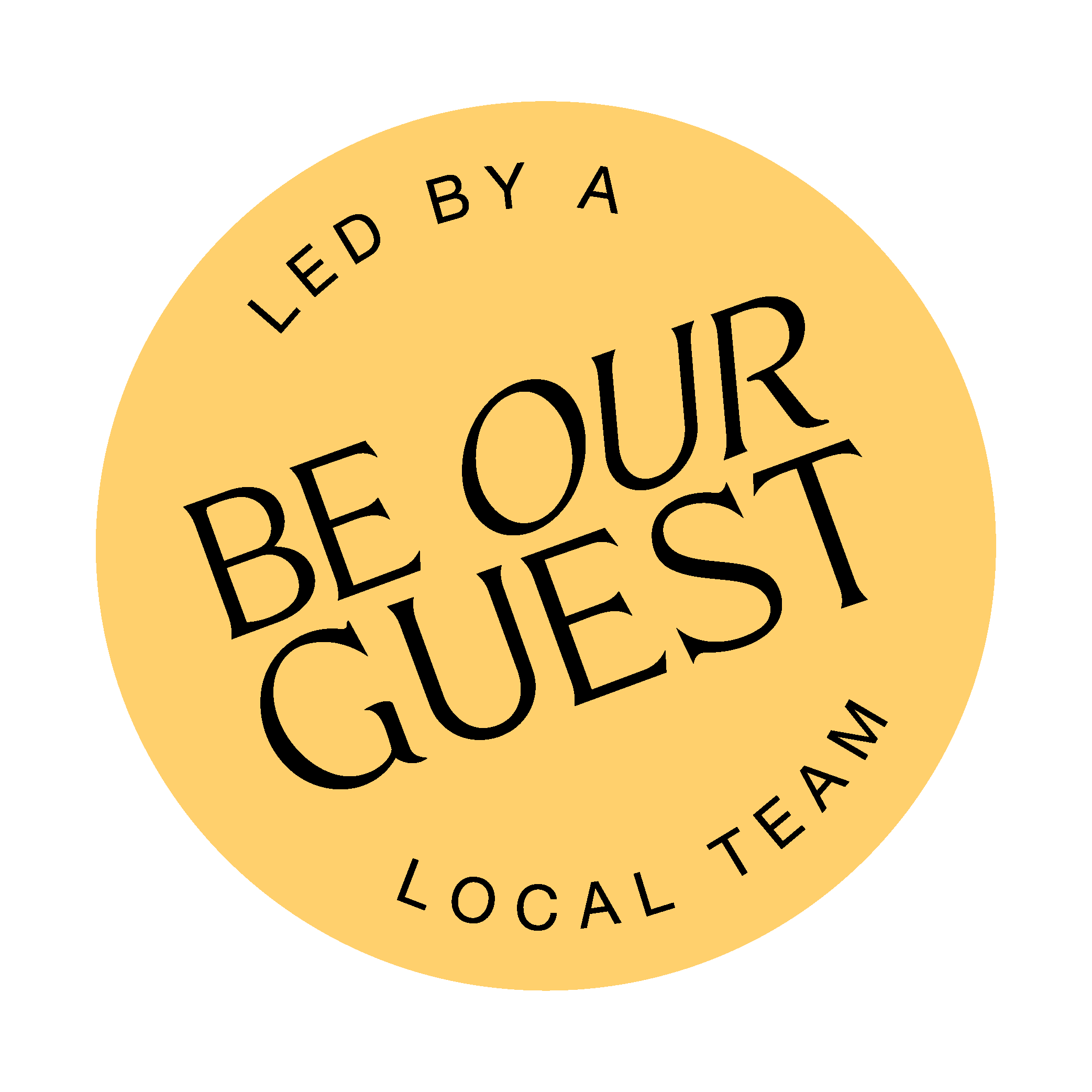 A badge with a yellow background and black text that reads 'Be Our Guest - led by a local team.'