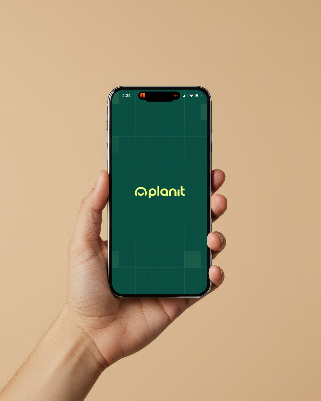 A person holding a smartphone displaying the Planit app logo on a green background.
