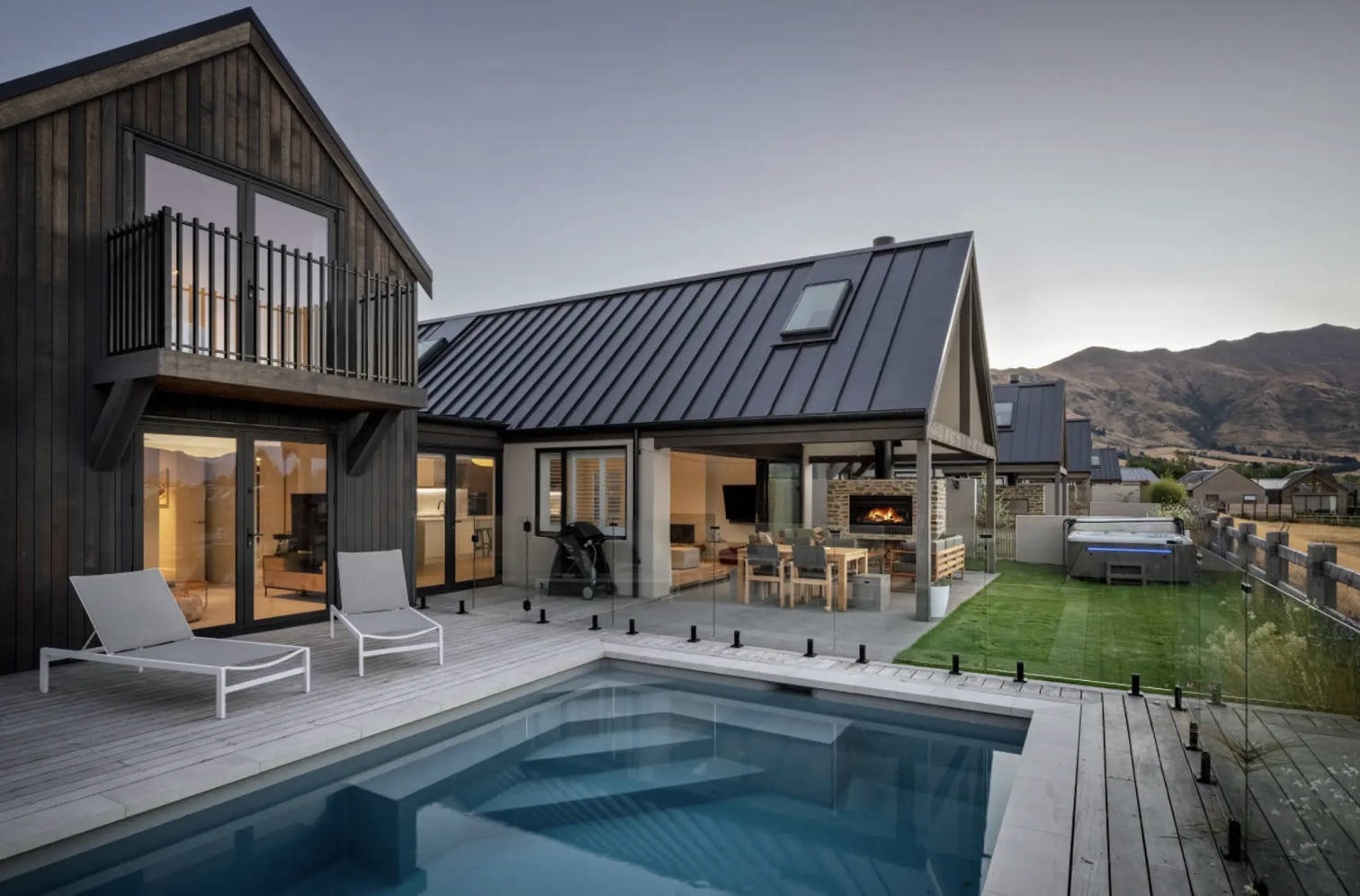 The house exterior and pool of Marjon Peak Retreat a Wanaka holiday home managed by Be Our Guest