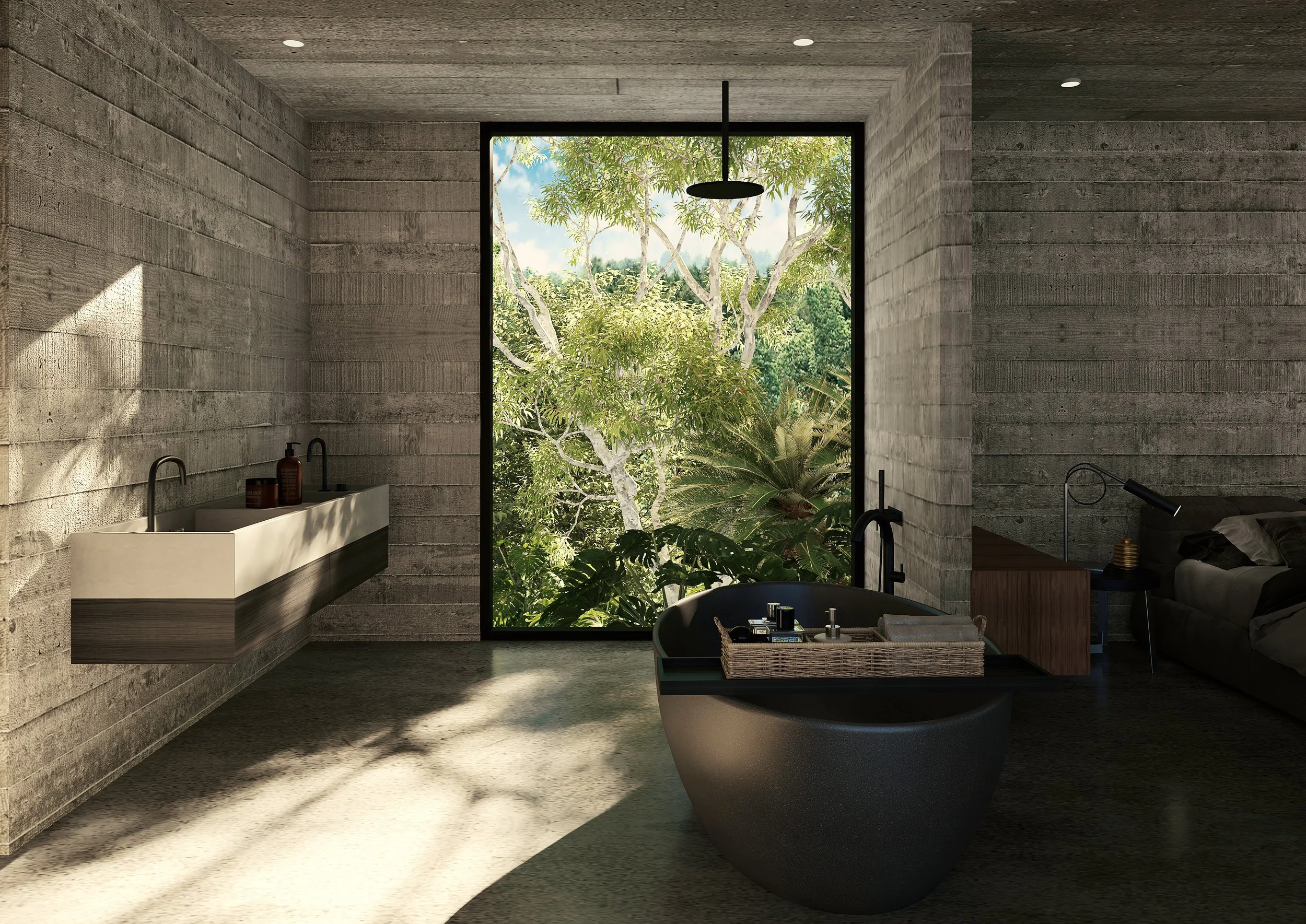 Modern bathroom with concrete walls and large window showing green trees outside. Contains a white rectangular sink with black fixtures, bottles on the sink, a black bathtub, and a black ledge with towels and decorative items, with natural light and ceiling lights.
