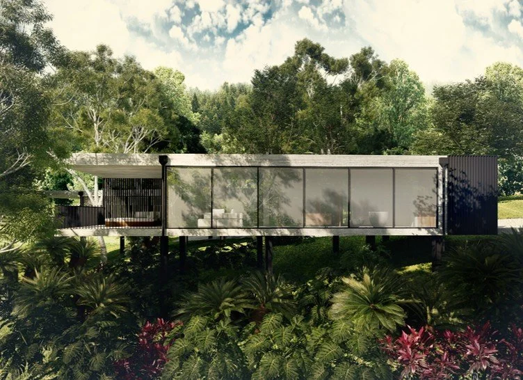 Modern house on stilts surrounded by lush greenery and tropical plants