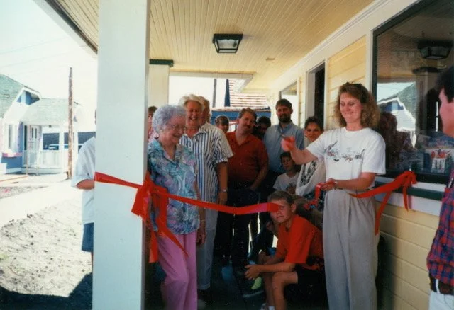 Anne cutting ribbon at candy store.jpeg