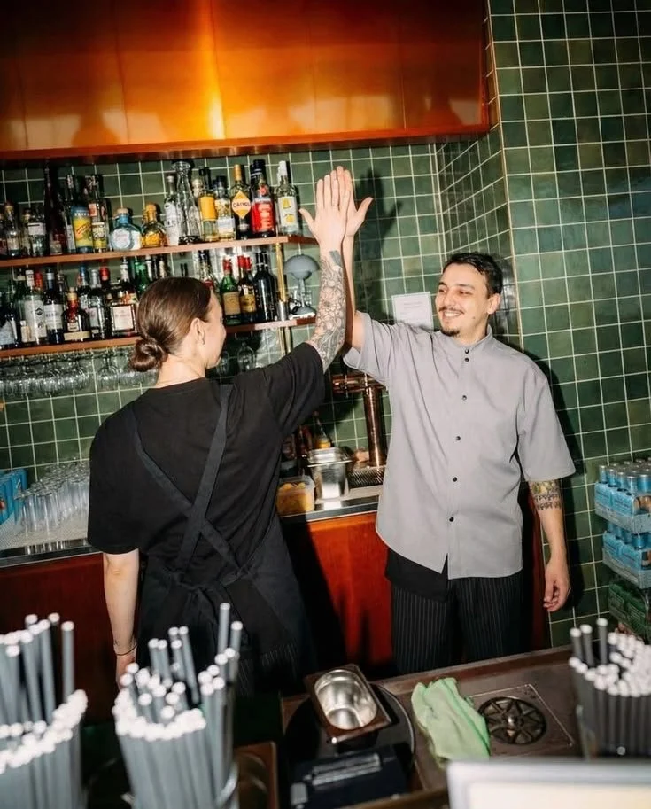chef and a bartender in a bar
