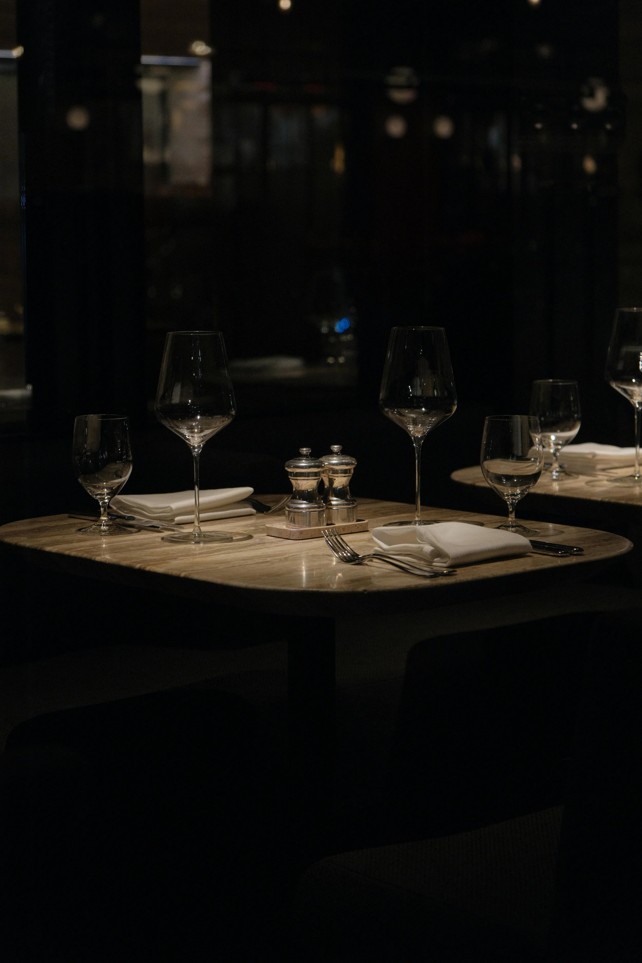 Set table with cutlery and crockery in a fine dine restaurant