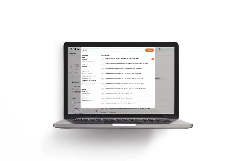 Open laptop displaying an online product search page with various items listed.