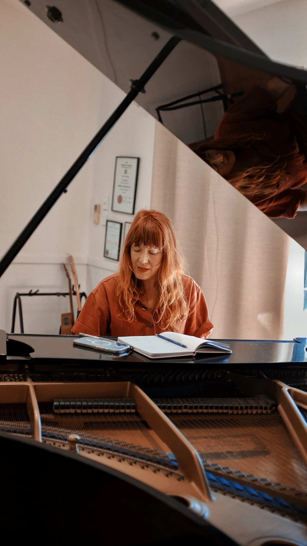 Melia signign at piano.jpeg