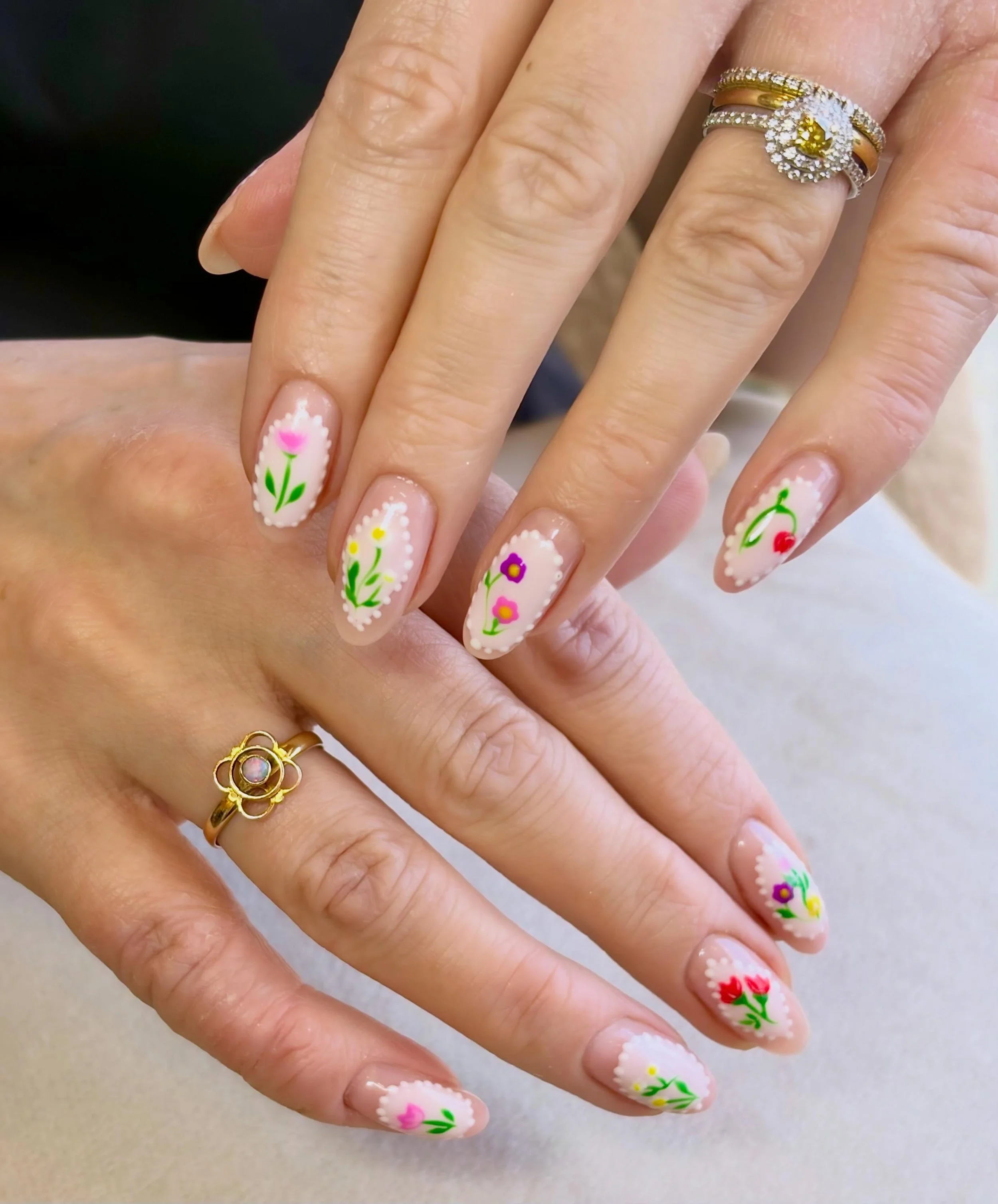 Floral magic ✨🌷🌼🌸
.
BIAB with level 3 nail art by Lidia. 
.
#flowernails #intricatenailart #summernailsinspo #calonbeauty #cardiff