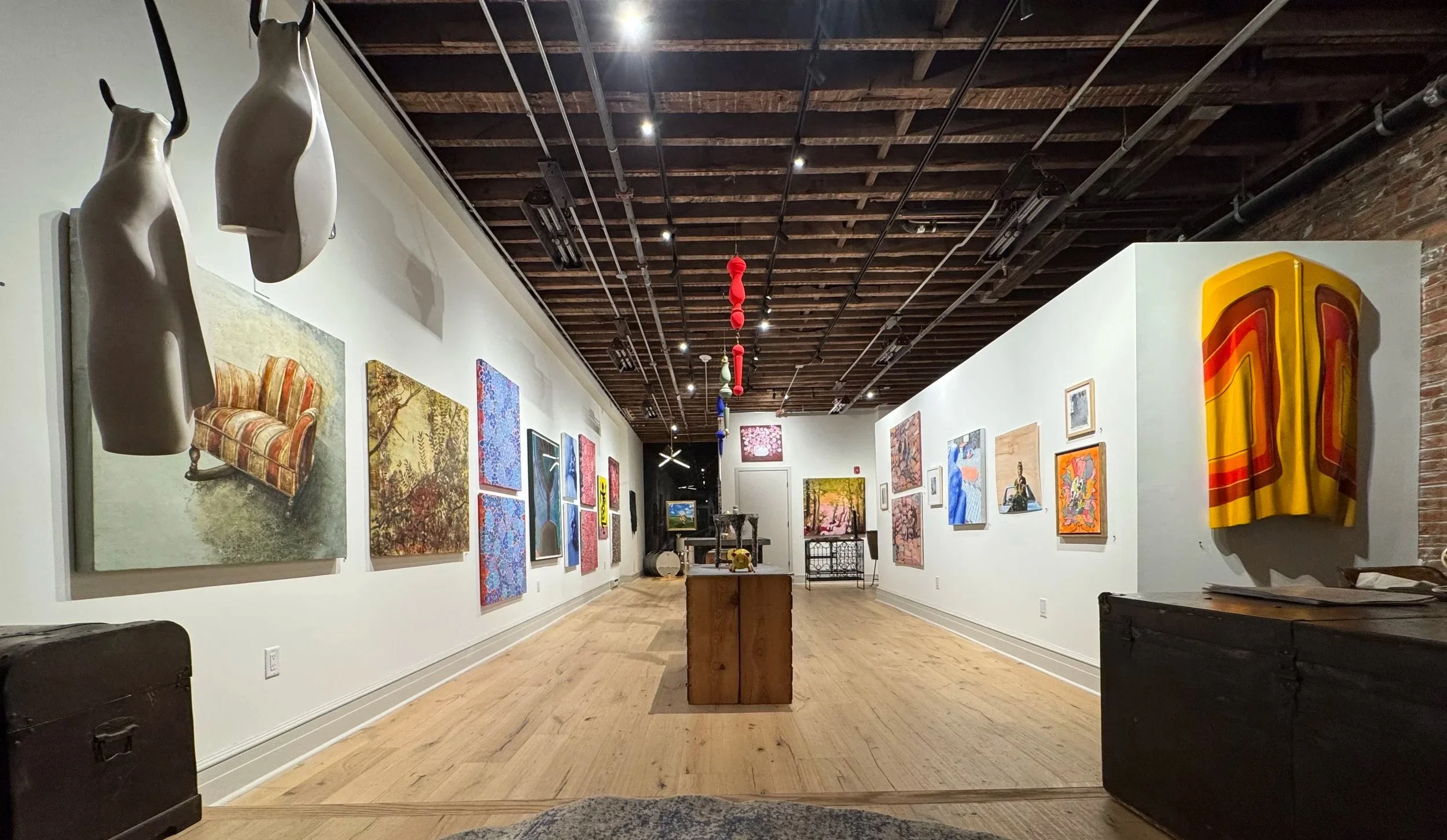 An interior view of art gallery the Curator Collective in Philadelphia.