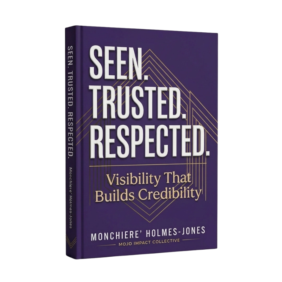 Book titled 'Seen. Trusted. Respected.' by Monchiere Holmes-Jones, with subtitle 'Visibility That Builds Credibility,' published by Mojo Impact Collective.