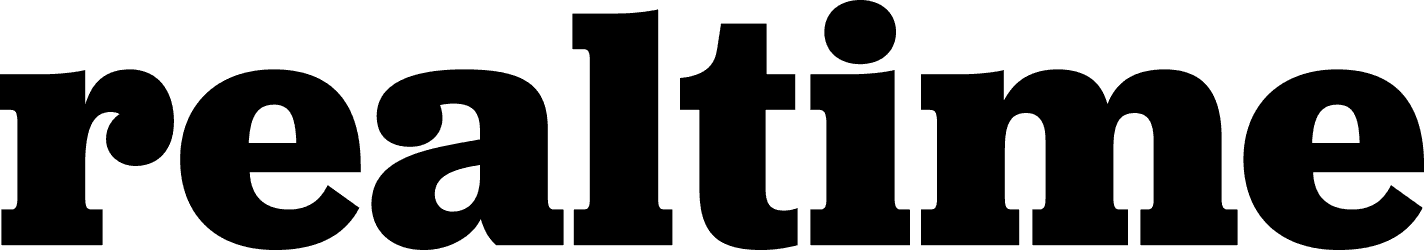 Close-up of the word 'realtime' in bold black letters on a white background.