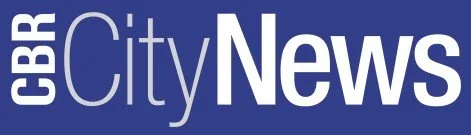 CBR City News logo in blue and white.