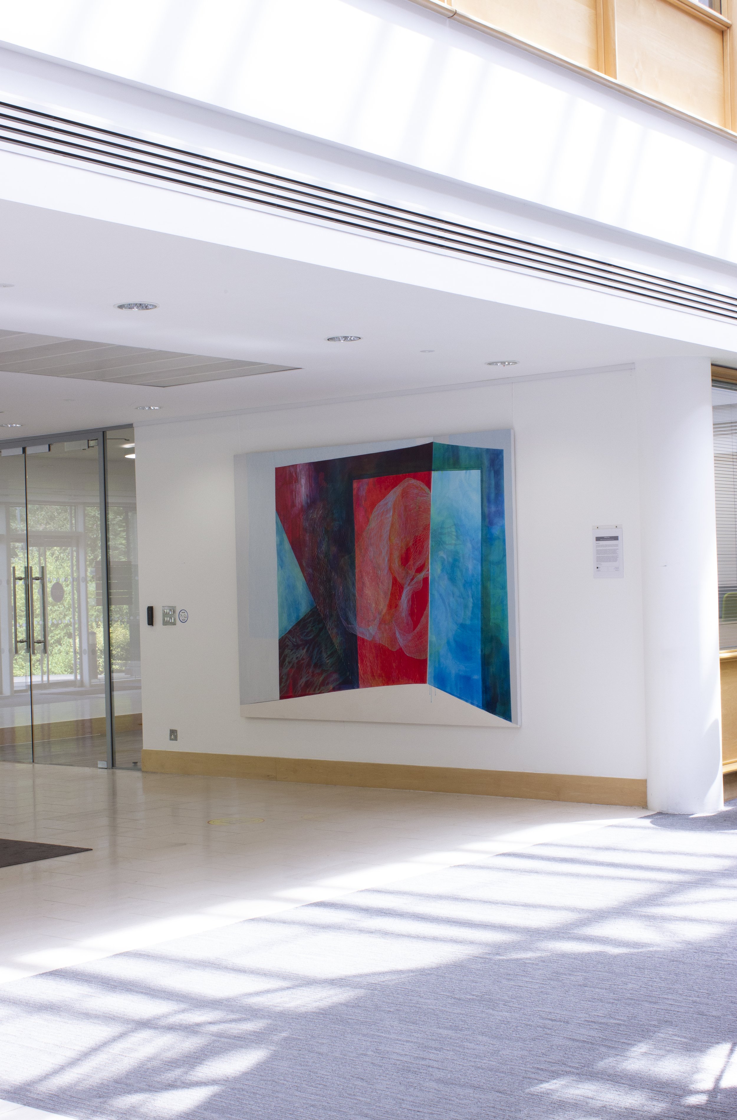 The distracted reader in atrium at Kingshill.jpg
