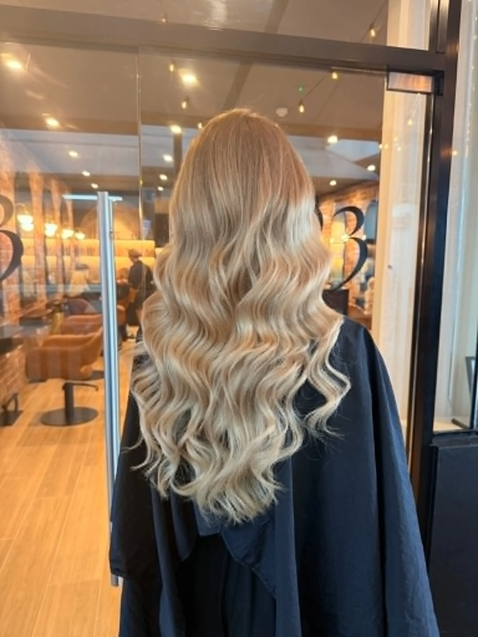 Emma Louise masterstylist glam waves at E23 Hair