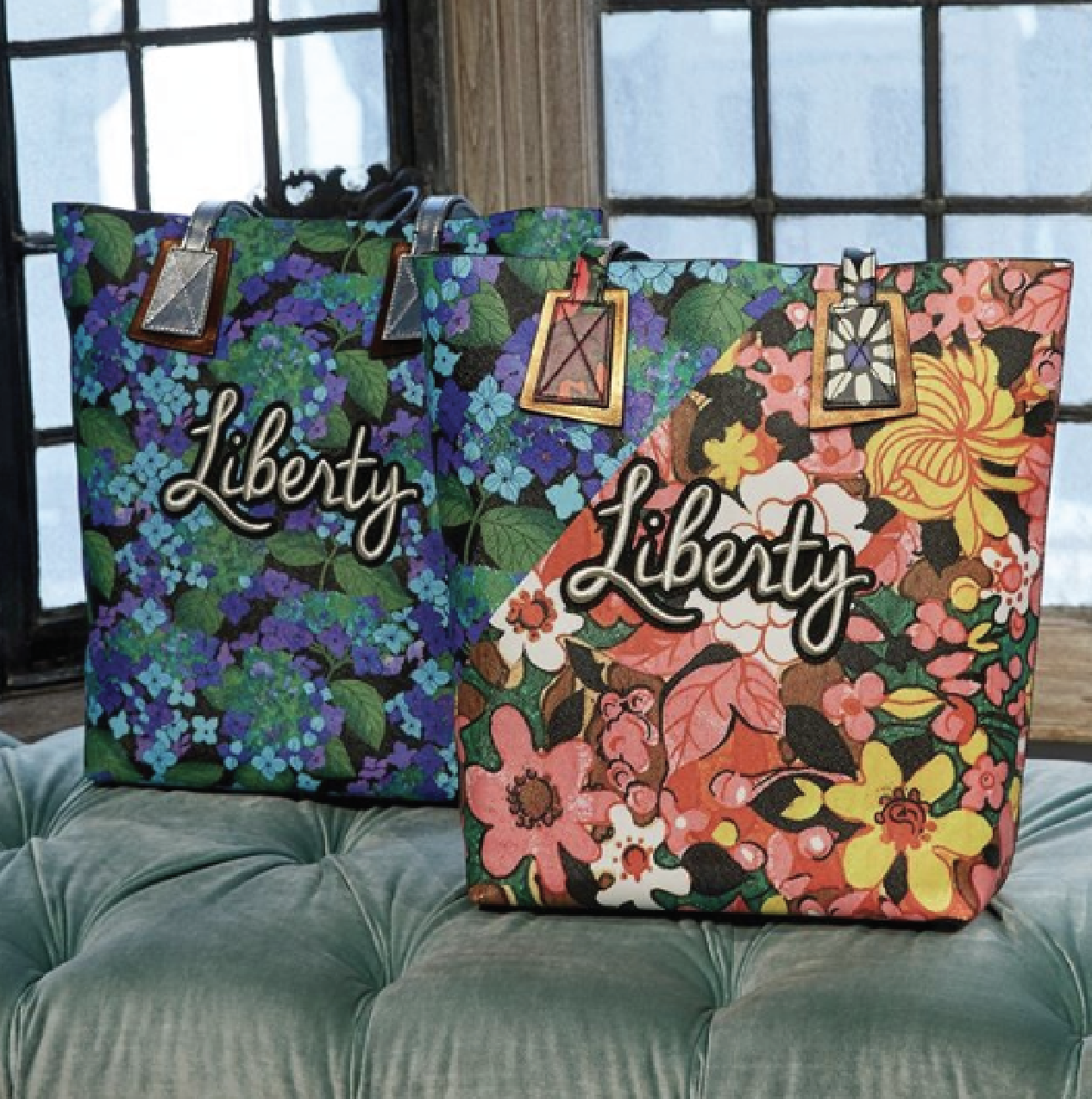 Two floral-print tote bags with embroidered script lettering