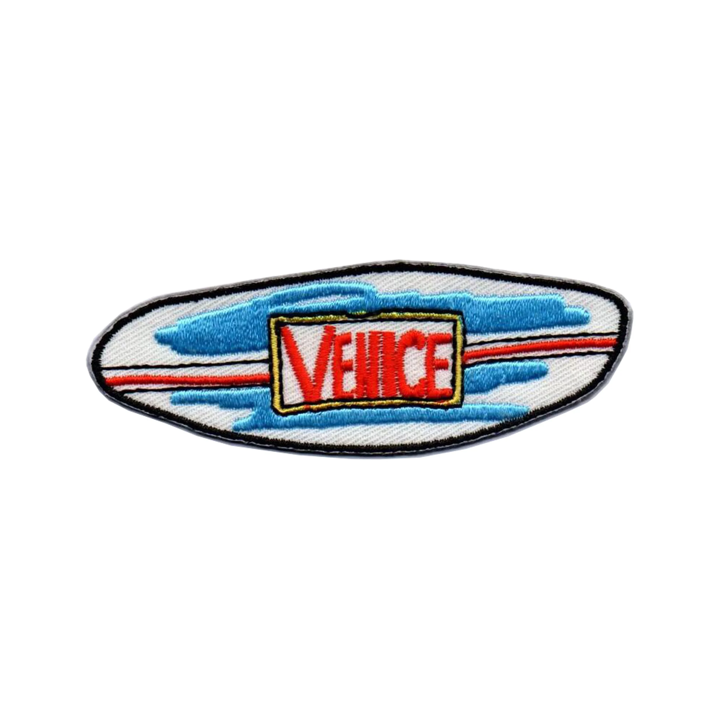 Oval embroidered patch reading Venice in a vintage beach-sign style