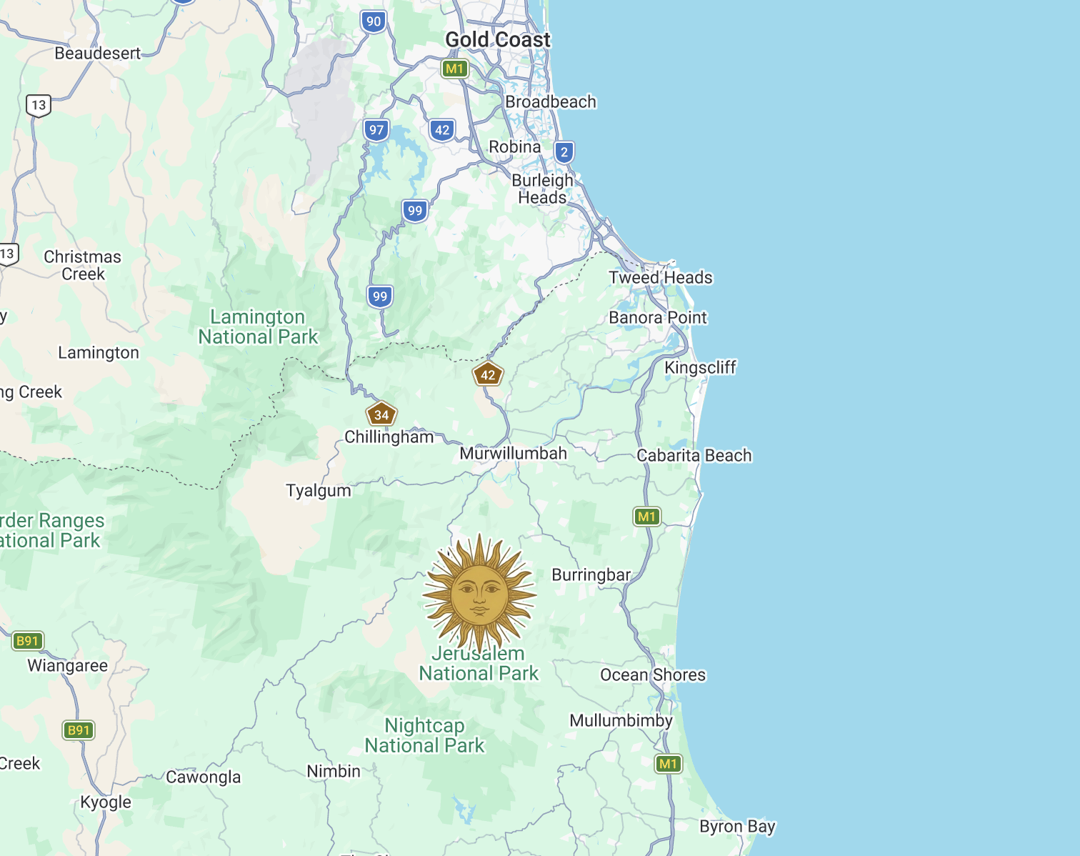 Map of eastern Queensland, Australia, showing cities, roads, national parks, and a sun icon near Jerusalem National Park.