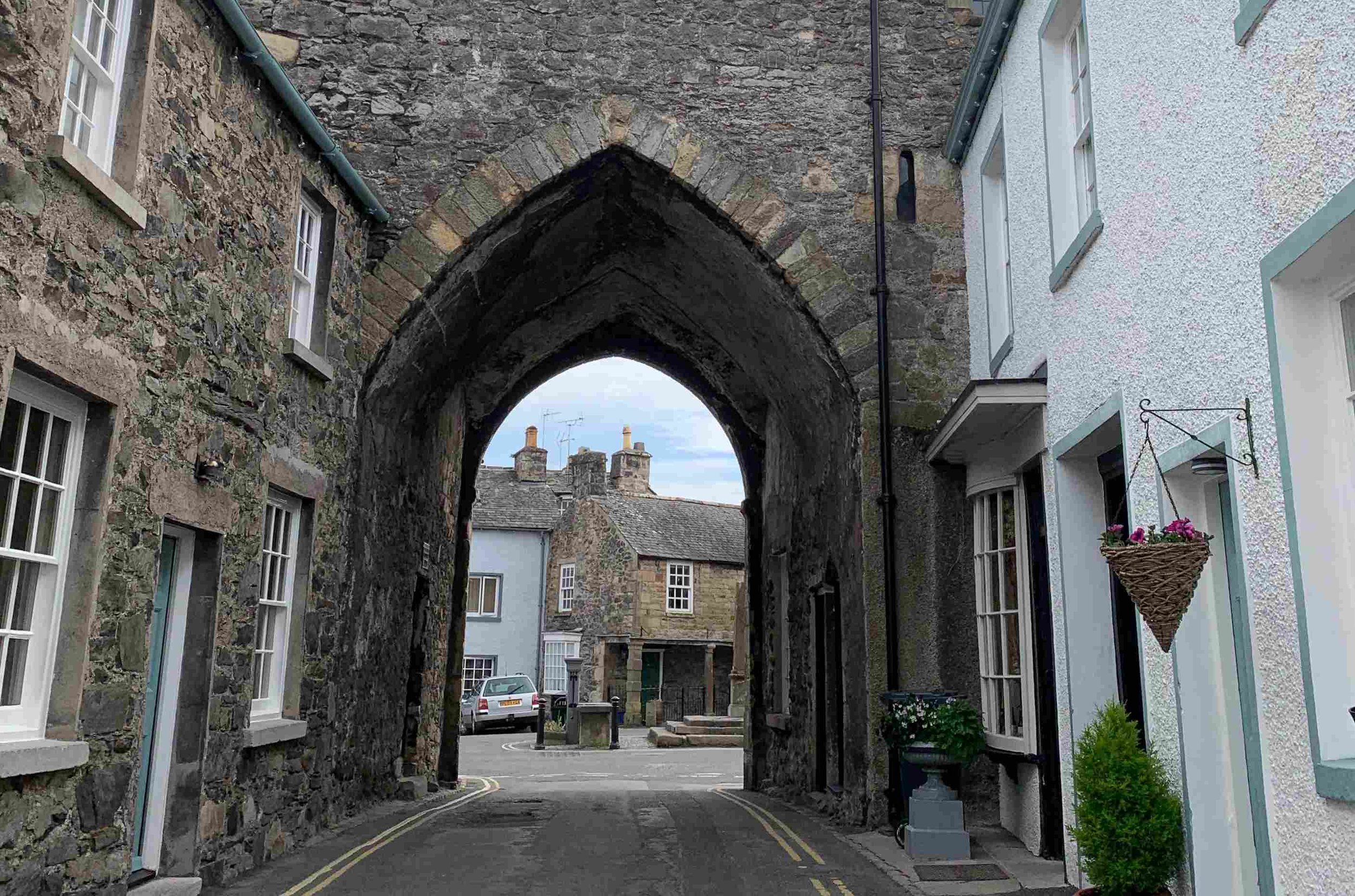 Medieval Cartmel Priory Gatehouse archway in Cartmel village, Cumbria