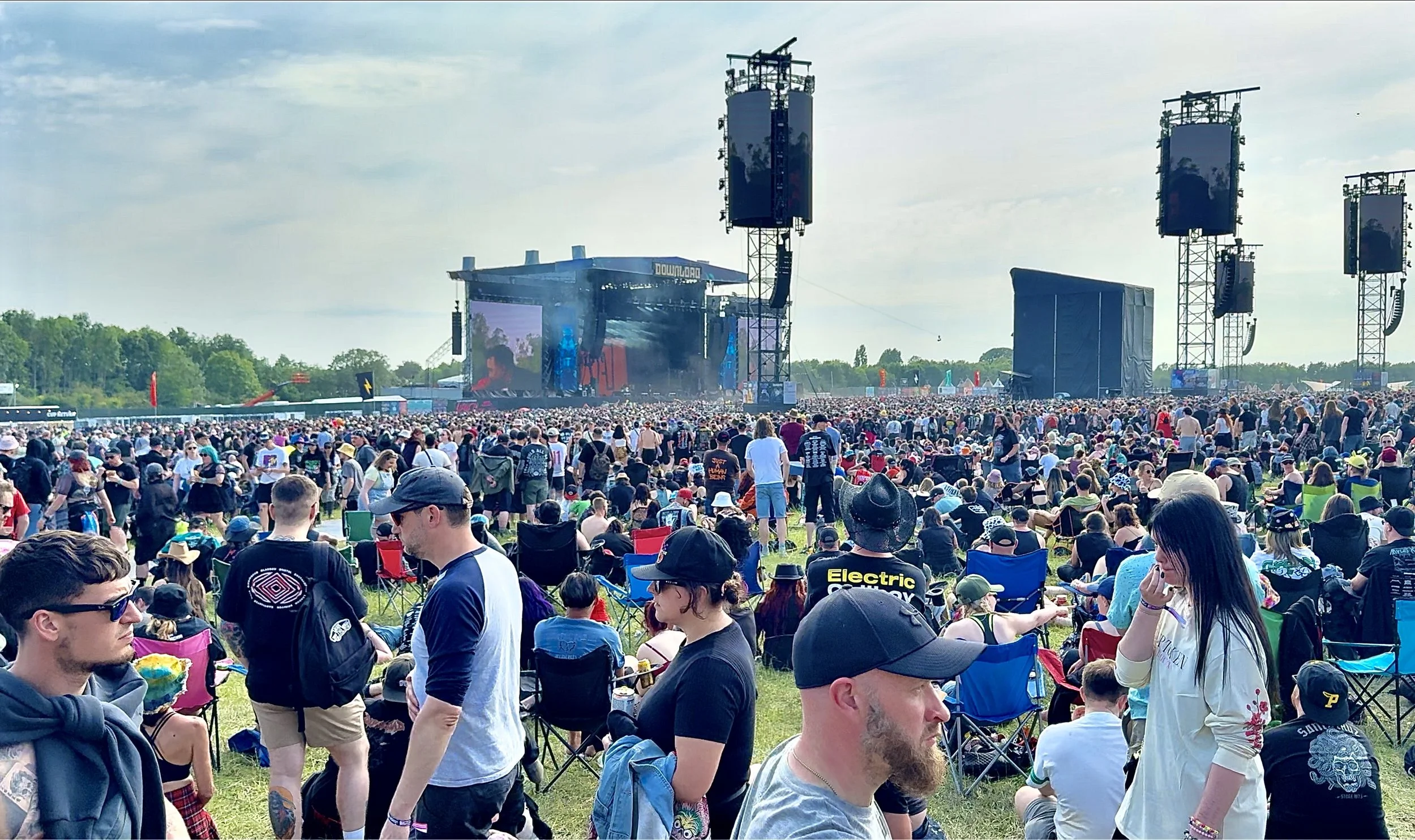 Looking over a large crowd towards the Download Festival Main stage in the distance