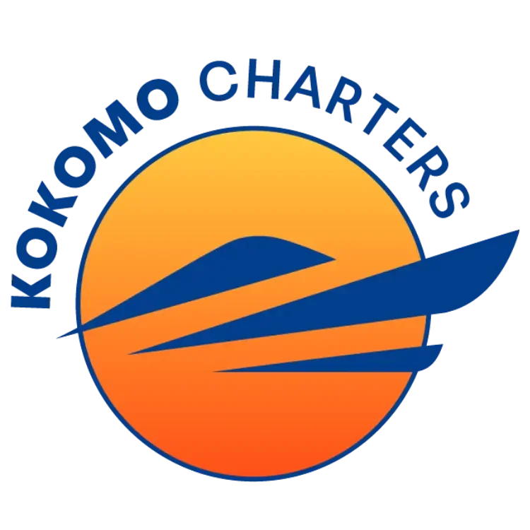 Logo of the Kokomo Chargers featuring an orange and yellow sun setting over blue stylized waves with the team name curved above.