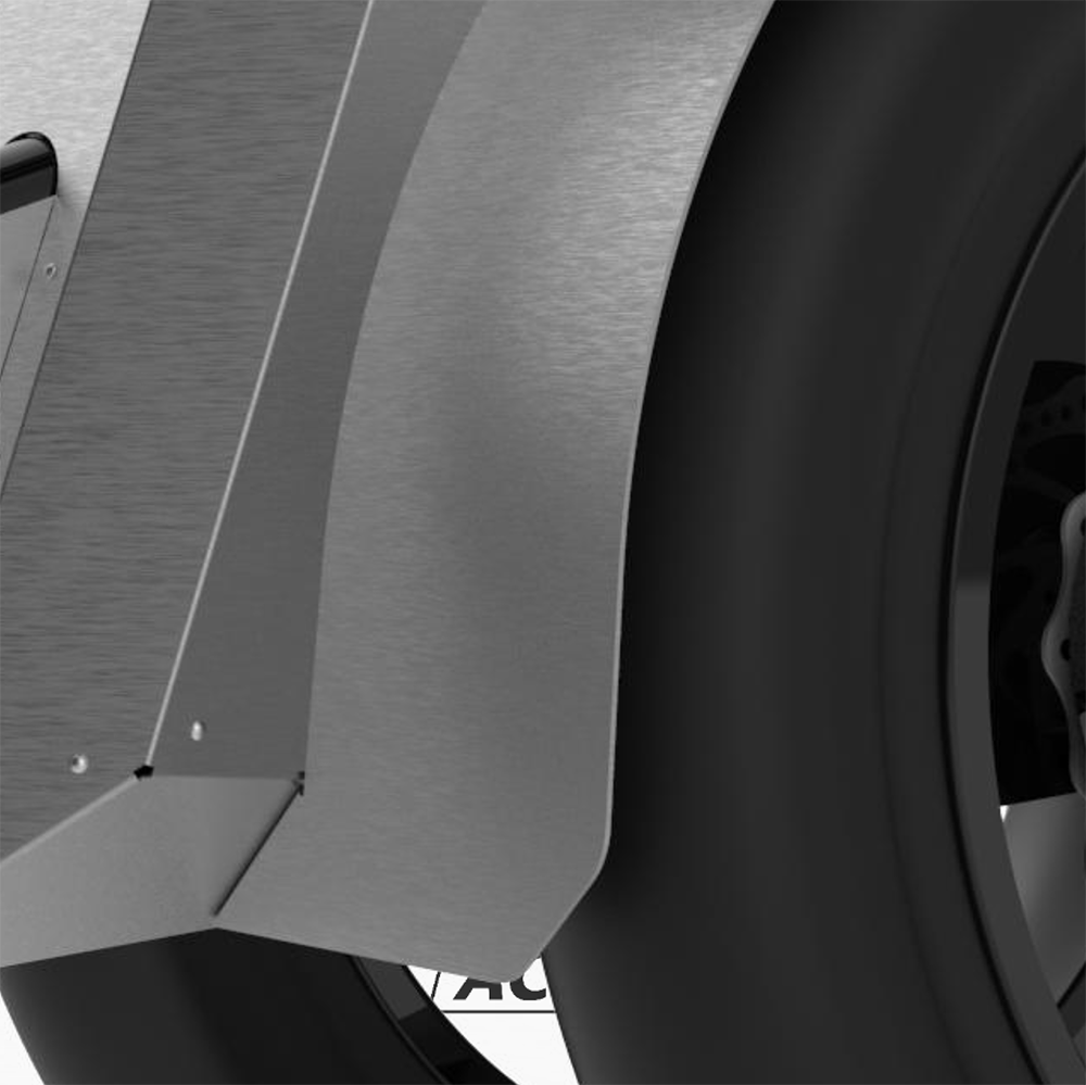 Close-up of a sleek, modern motorcycle wheel and fender, with a portion of the tire visible.