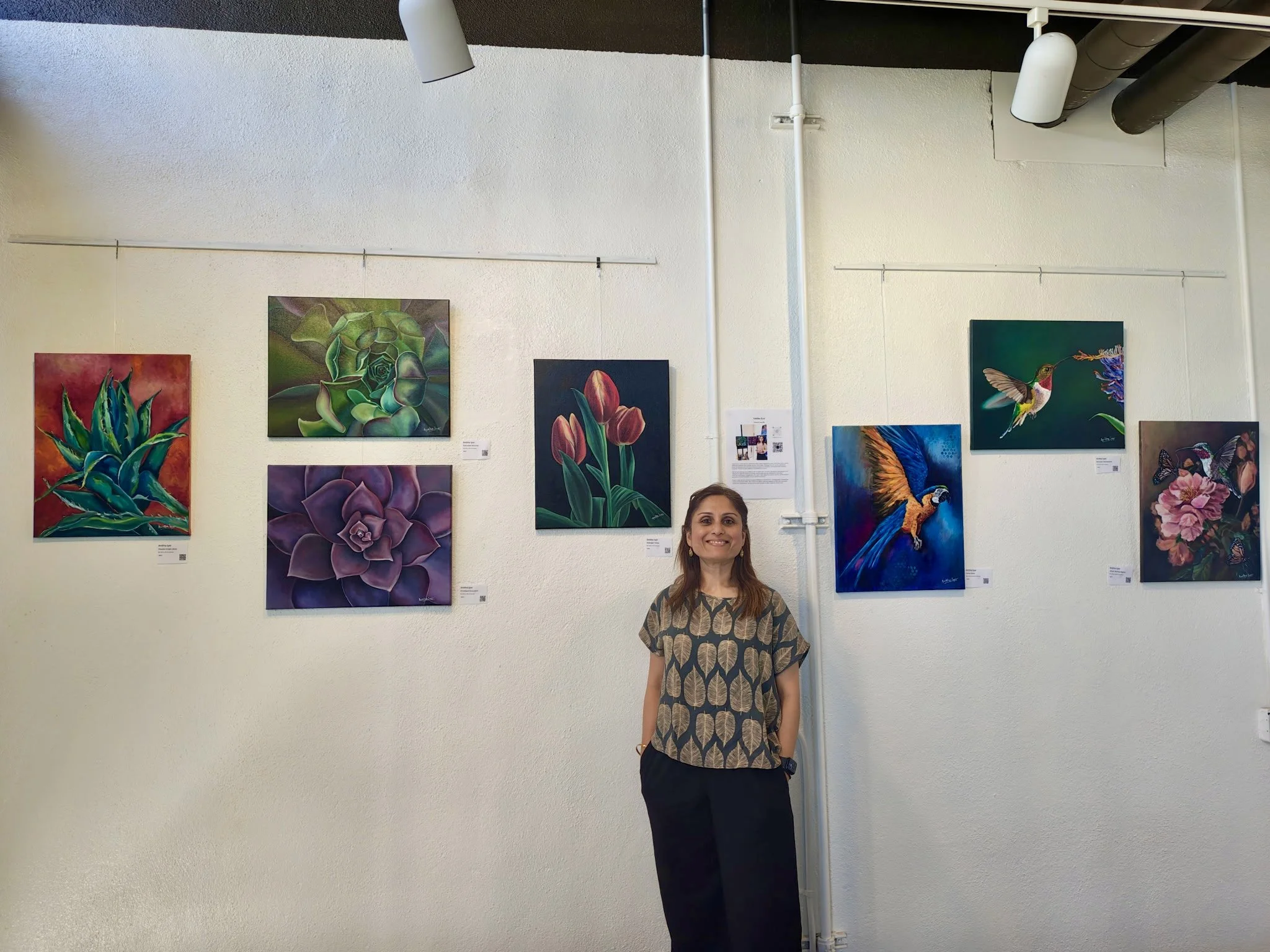 Artist Anitha Iyer with selected works from her current exhibition at Brooklyn West Winery, Oakland.