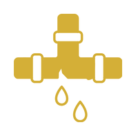 A gold faucet with water droplets falling from it