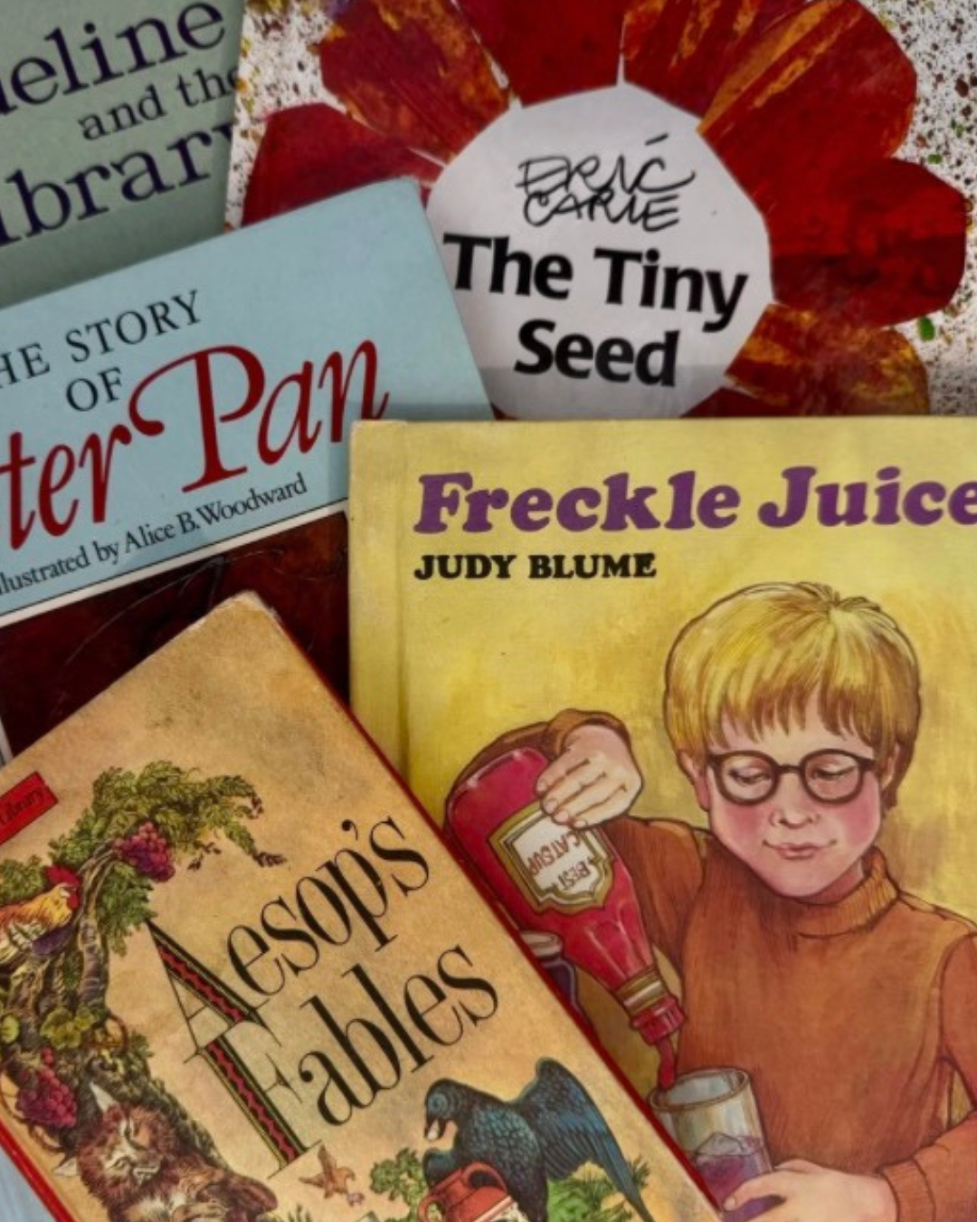 A collection of children's books, including 'The Story of Peter Pan,' 'Freckle Juice' by Judy Blume, 'Asop's Fables,' 'The Tiny Seed,' and 'Celine and the Library.'